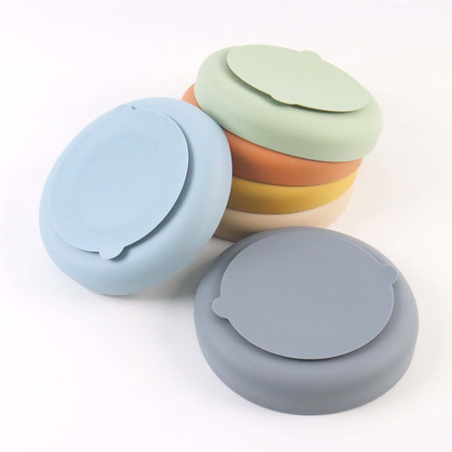 Underside view of six Collarva slow feeder bowls showing their suction-cup bases